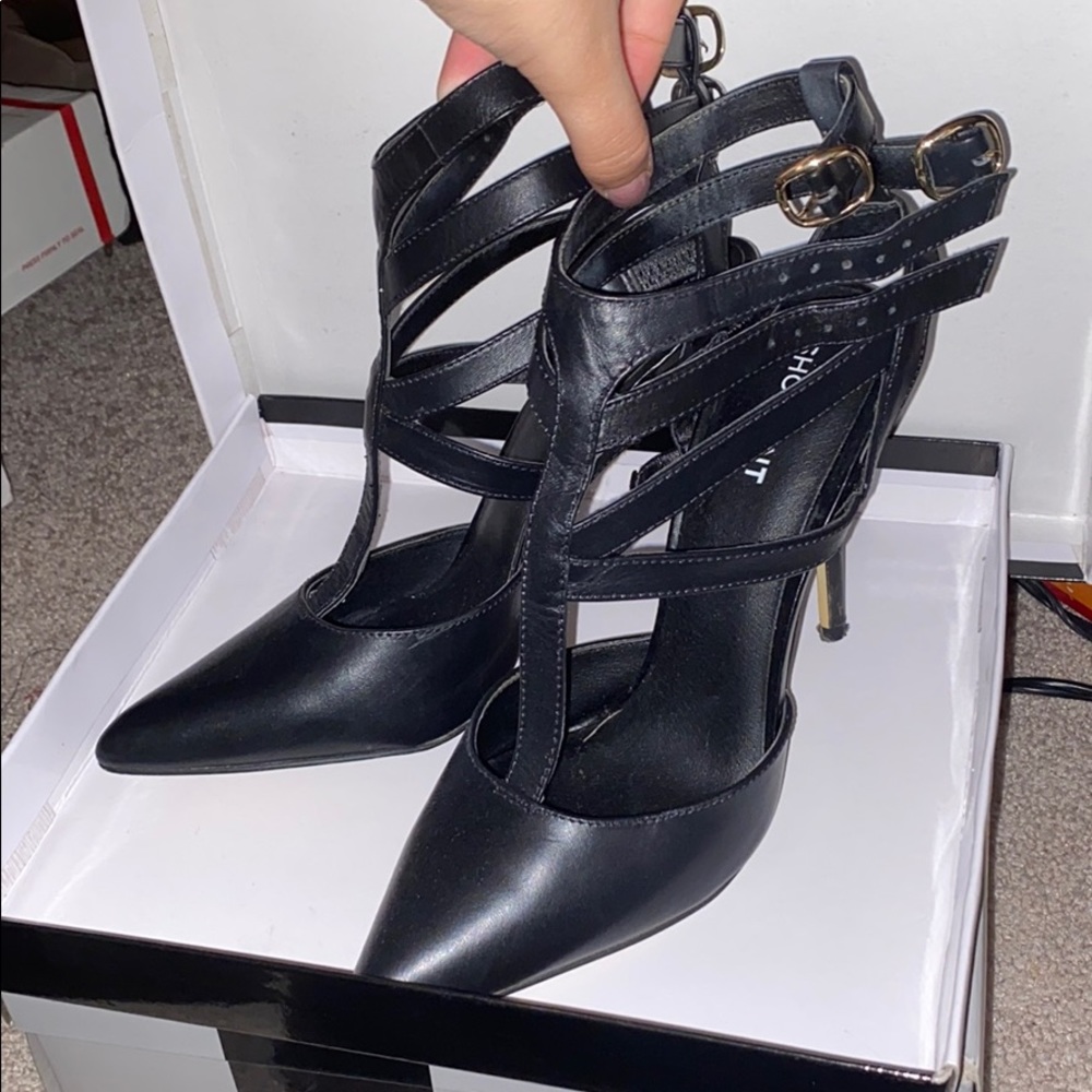 Black strappy pointed toe heels